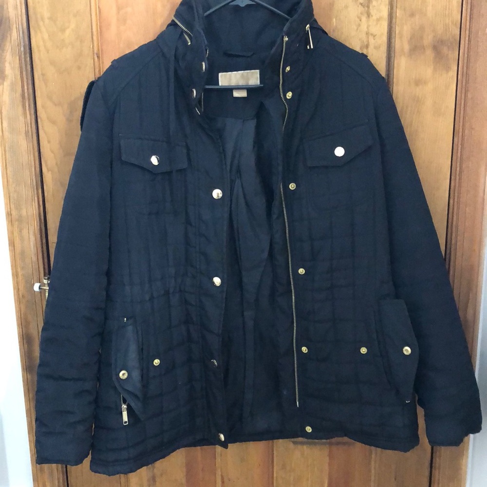 Sleek black Michael Kors jacket with gold details